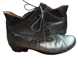Leather metallic black and blue ankle boots, side zipper, front lace up.